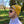 Load image into Gallery viewer, Close-up of a man wearing a knit beanie in golden yellow.
