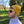 Load image into Gallery viewer, Close-up of a man wearing a knit beanie in golden yellow.