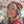 Load image into Gallery viewer, Close-up of a woman wearing a knit beanie in dark rose.
