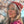 Load image into Gallery viewer, Close-up of a woman wearing a knit beanie in dark rose.